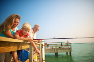 family fishing on sanibel lighthouse pier